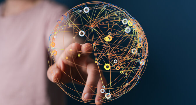 Hand touching network globe, represents global connectivity, digital world, technology and data. Shows connection and communication.