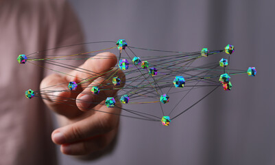 Abstract network visualization held in a hand showing connections and relationships. Perfect for data, tech, sc