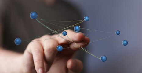 Hand reaching towards a digital network, representing connection, communication, and technology. Ideal for conc