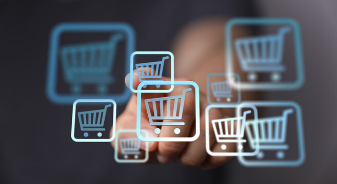 Hand pressing shopping cart icons suggesting online shopping and digital commerce. Buy, purchase, e-commerce concept.