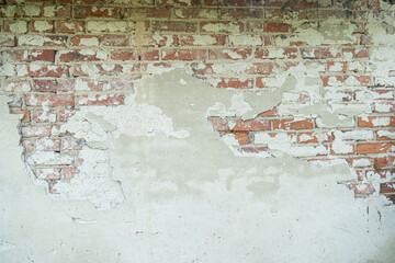 old brick wall, red and white colour, broken bricks, peeling plaster, vintage texture, background for banner, copy space