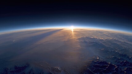 Stunning View of Earth's Atmosphere and Mountain Ranges at Sunrise from Space Perspective