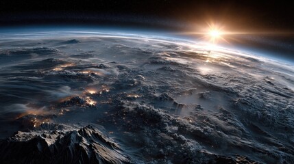 View of Earth from Space Showing Sunrise Over Mountain Ranges and Cloud Cover