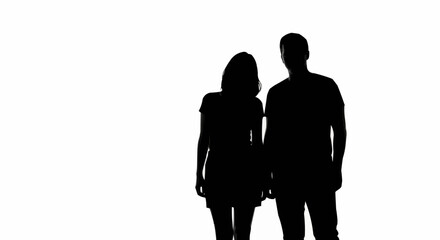 Silhouette of a couple standing together, symbolizing unity and partnership.