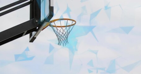 Lime player driving layup to score, defender jumping, ball arcing through hoop against blue overlay