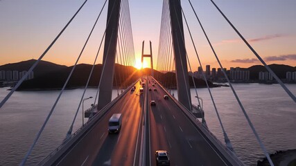 A modern concrete bridge stretches across a serene body of water at sunset, capturing the concept of technological innovation and progress while evoking feelings of efficiency, reliability.