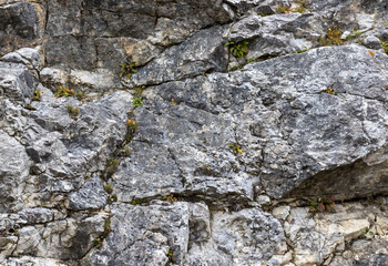 the structure of mountains and stone plateaus of natural origin in a mountainous area, walking on the ground