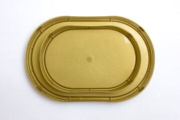 Some colorful plastic container lids on a white background, copy space, background and texture