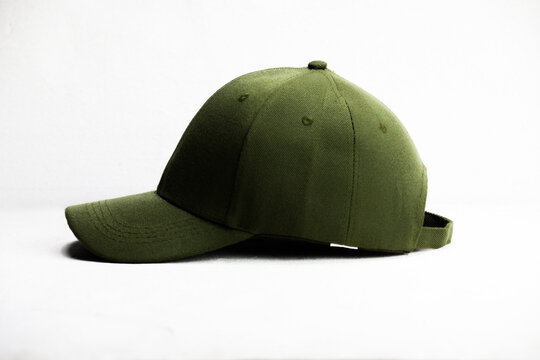 Minimalist studio shot of an olive green baseball cap isolated on a clean white background. Perfect for fashion, apparel branding, retail product listings, or promotional design mockups