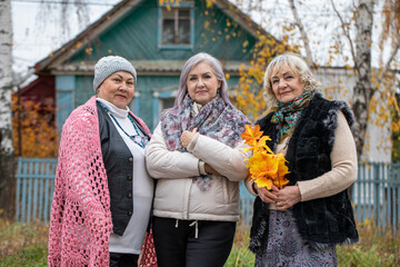 Portrait of three elderly rural women - a villager