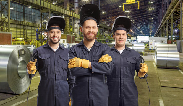 Group of welders at a factory