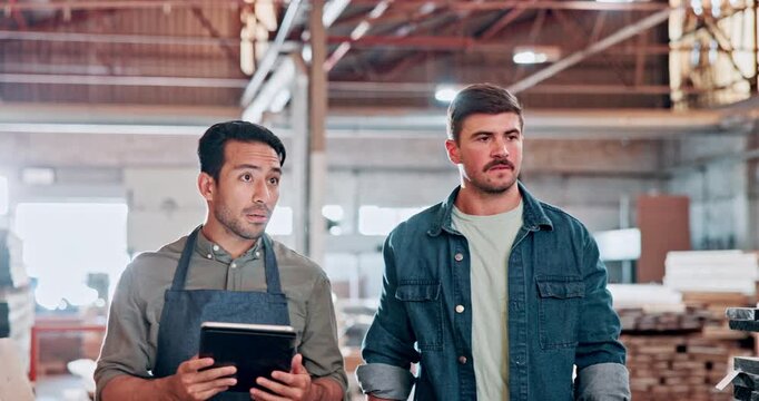 Carpentry, men or walking with tablet in workshop for project update, manufacturing or compliance. Carpenter, inspector and feedback with tech in warehouse for furniture production or quality control