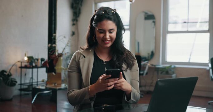Happy, woman or laptop in small business with phone, text message or customer feedback in hair salon. Person, computer or tech with smile in hairdresser for good review, client email or satisfaction.