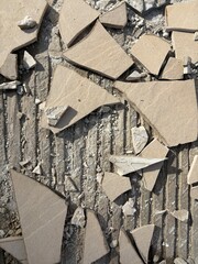 Broken Cracked Concrete Pavement. Damaged Urban Sidewalk Tiles. Deteriorated Street Surface. Uneven Ground Infrastructure. Pedestrian Hazard. Weathered City Walkway. Maintenance Repair Needed Issue