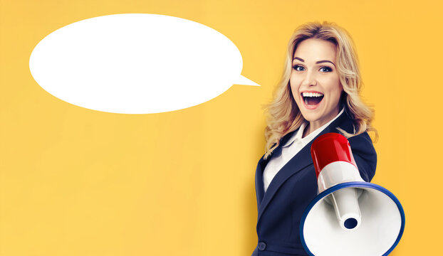 Image - expressive happy smile cute woman speak megaphone loudspeaker loud speaker, isolate orange yellow background with empty mockup speech bubble. Blond girl in suit jacket hold mega phone bullhorn