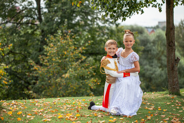 Fototapeta premium A children dancing couple dressed as characters from the novel War and Peace