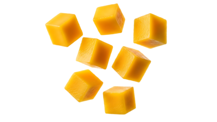 Seven Yellow Mango Cubes Floating Against Black Background