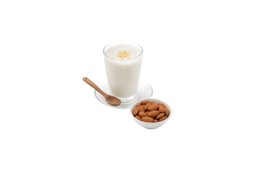 A flowering almond branch alongside a cup of almond milk on a white backdrop. Healthy eating idea. Room for text.
Beauty theme.