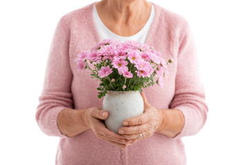 Senior arranging flowers in vase isolated on transparent background