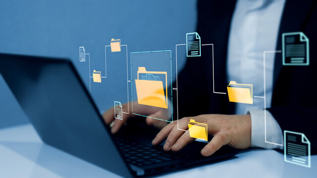 Online documentation database and document management system concept. Businesswoman working on laptop with virtual screen. Process automation to efficiently manage files.	
