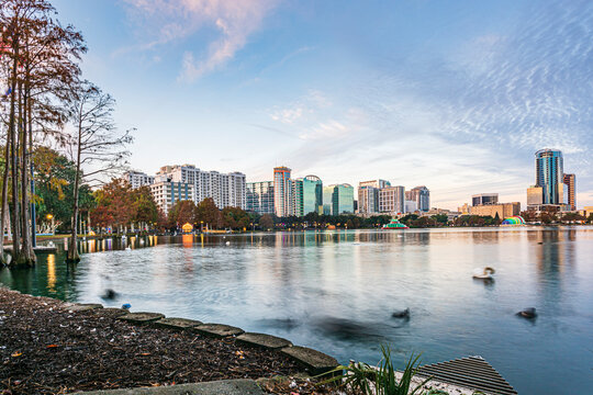 Amazing view of Orlando skyline in Florida and reflection in Lake Eola.