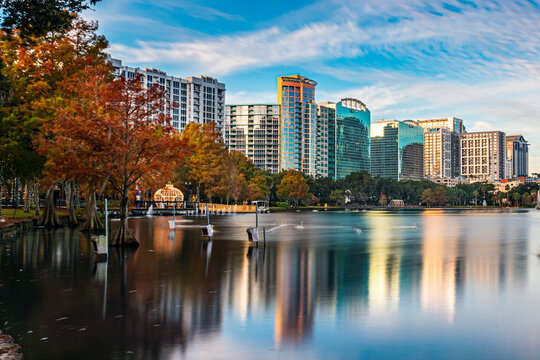 Amazing view of Orlando skyline in Florida and reflection in Lake Eola.
