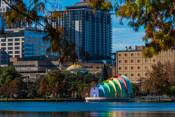 Amazing view of Orlando skyline in Florida and reflection in Lake Eola.