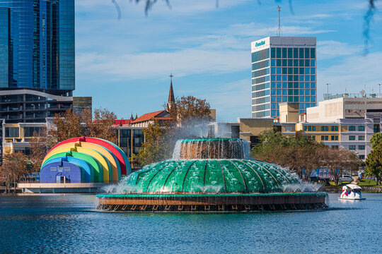 Amazing view of Orlando skyline in Florida and reflection in Lake Eola.