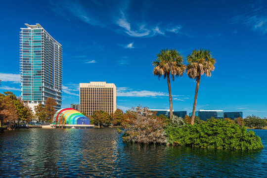 Amazing view of Orlando skyline in Florida and reflection in Lake Eola.
