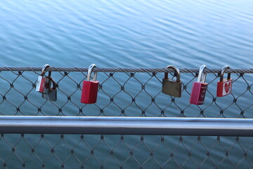 Love Locks on Fence Over Water