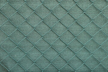 Textured Green Fence with Diamond Pattern
