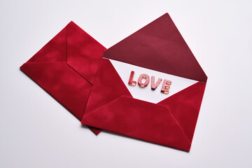 Red envelope revealing love message for valentine's day