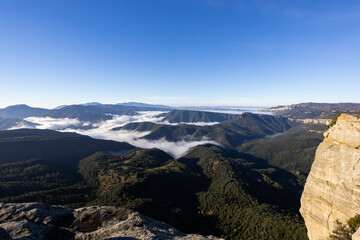 Garrotxa valley sunrise with sea of clouds