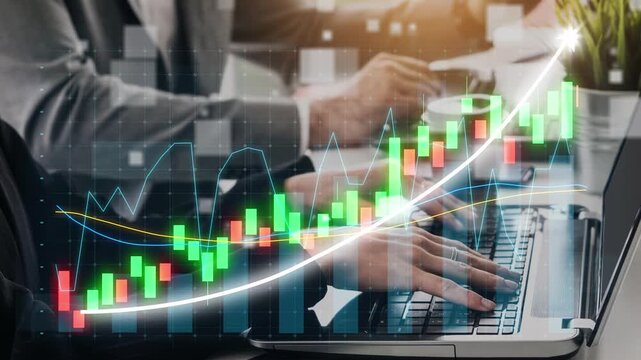 A dynamic business scene showcasing a team working on financial data and stock market trends with charts visualized on a laptop in a modern office environment. Copula - Powered by Adobe