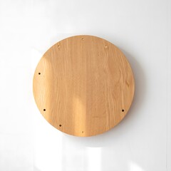 Simple wooden circle with small holes on white background