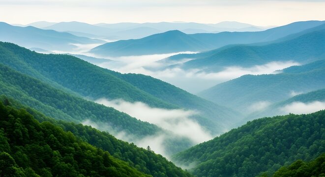 Layers of mountains and fog in a lush green valley - Powered by Adobe