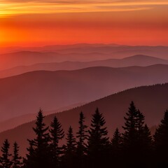 Obraz premium A scenic sunset over layered mountain ranges, with silhouettes of trees framing the bottom. Vivid orange and red hues dominate