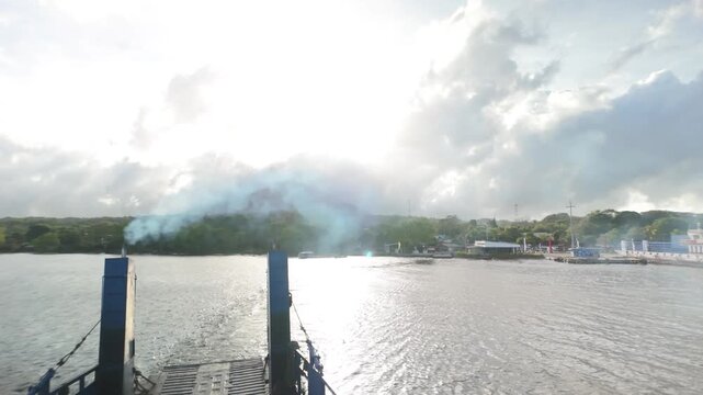 Experience the ferry ride from Ometepe Island to San Jorge, showcasing beautiful views and the vibrant activity on Lake Nicaragua.