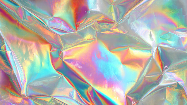 A vibrant, crumpled holographic foil surface shimmers with iridescent rainbow colors, creating a dynamic, abstract, futuristic texture and background.