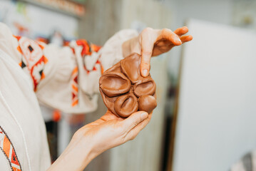 Female Hands Sculpting Clay – Traditional Pottery Workshop Art