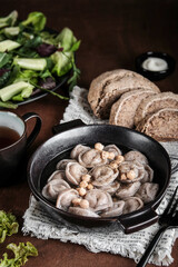 Comfortable countryside dinner with savory dumplings and crispy bread