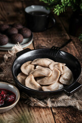 Comforting meal featuring dumplings and tea in charming rustic environment