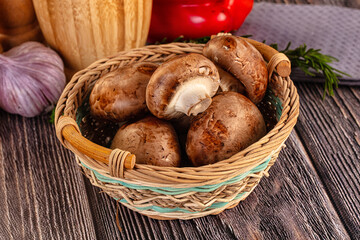Raw brown champignon heap for cooking