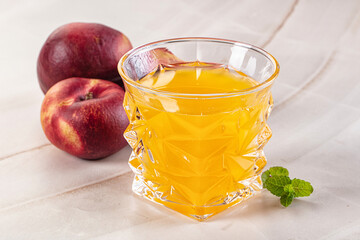 Vitamin beverage - peach juice glass