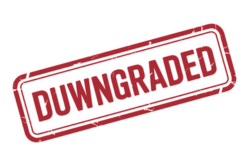 A red rubber stamp with the word DOWGRADED imprinted on a white background.