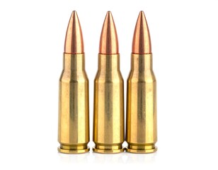 Ammunition closeup of three rifle bullets on a white background, close up