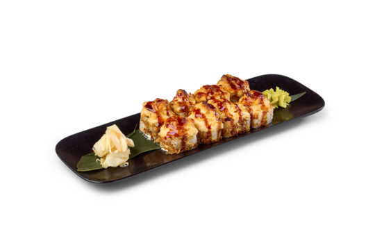 Baked sushi rolls with sauce, pickled ginger, and wasabi on a black rectangular plate