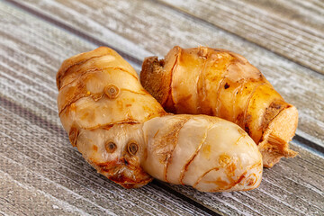 Raw galangal roots heap seasoning