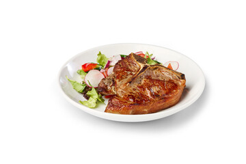 Grilled t-bone steak serving a healthy high-protein dinner with fresh vegetables on white