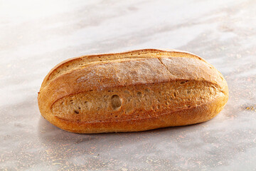 Rustic crusty brown loaf bread